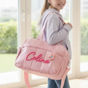 20260526-102121 On-body View of Nameli Custom Name Embroidered Pink Kids Duffle Bag for Girls