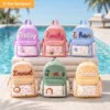 Collection of personalized corduroy backpacks for toddlers in pastel pink, blue, purple, and green