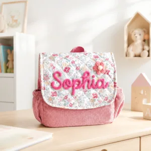 Close-up of Nameli Custom Pink Sophia Corduroy Kids Backpack with Dainty Floral Flap