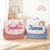 Nameli Custom Name Pink Sophia and Blue James Corduroy Toddler Backpacks on Wooden Table